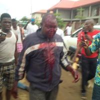 Mob beat okada man to near death after he snatched baby from mother in Lagos [PHOTOS]